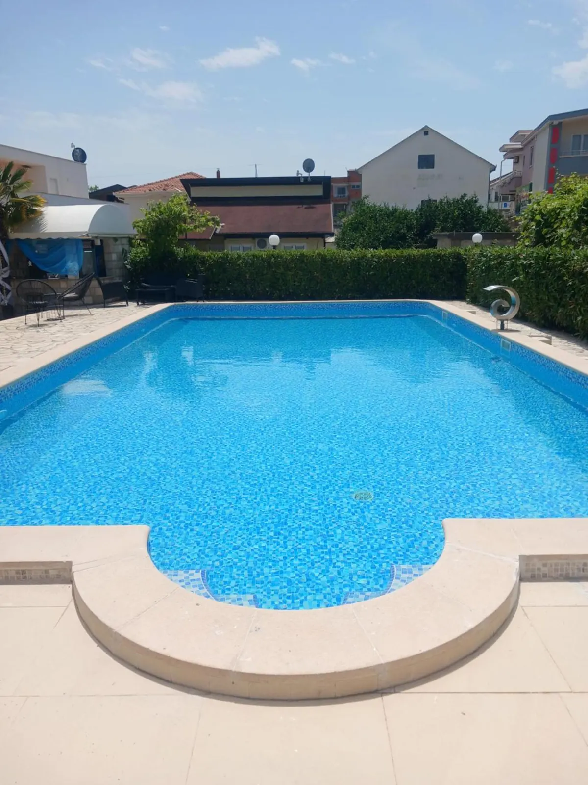 Steps leading into the outdoor pool