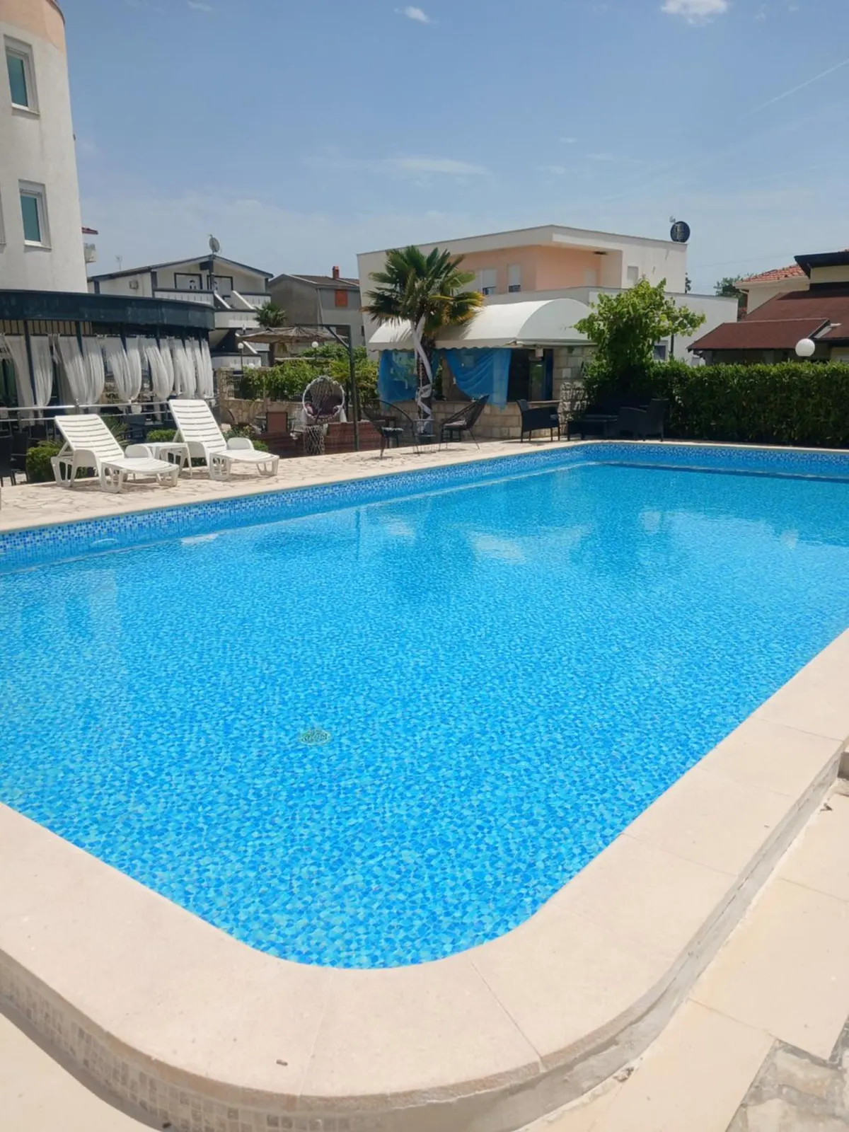 Wide view of the seasonal outdoor pool