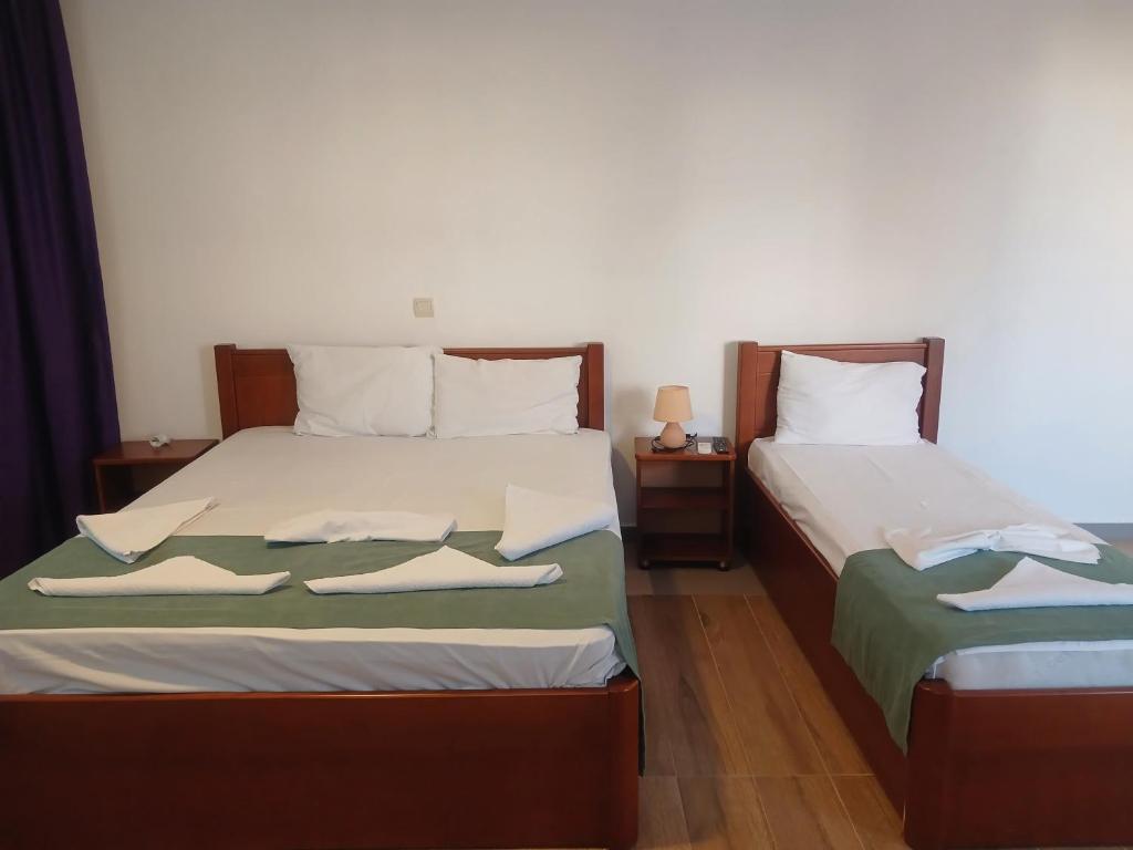 Guest room with two prepared beds